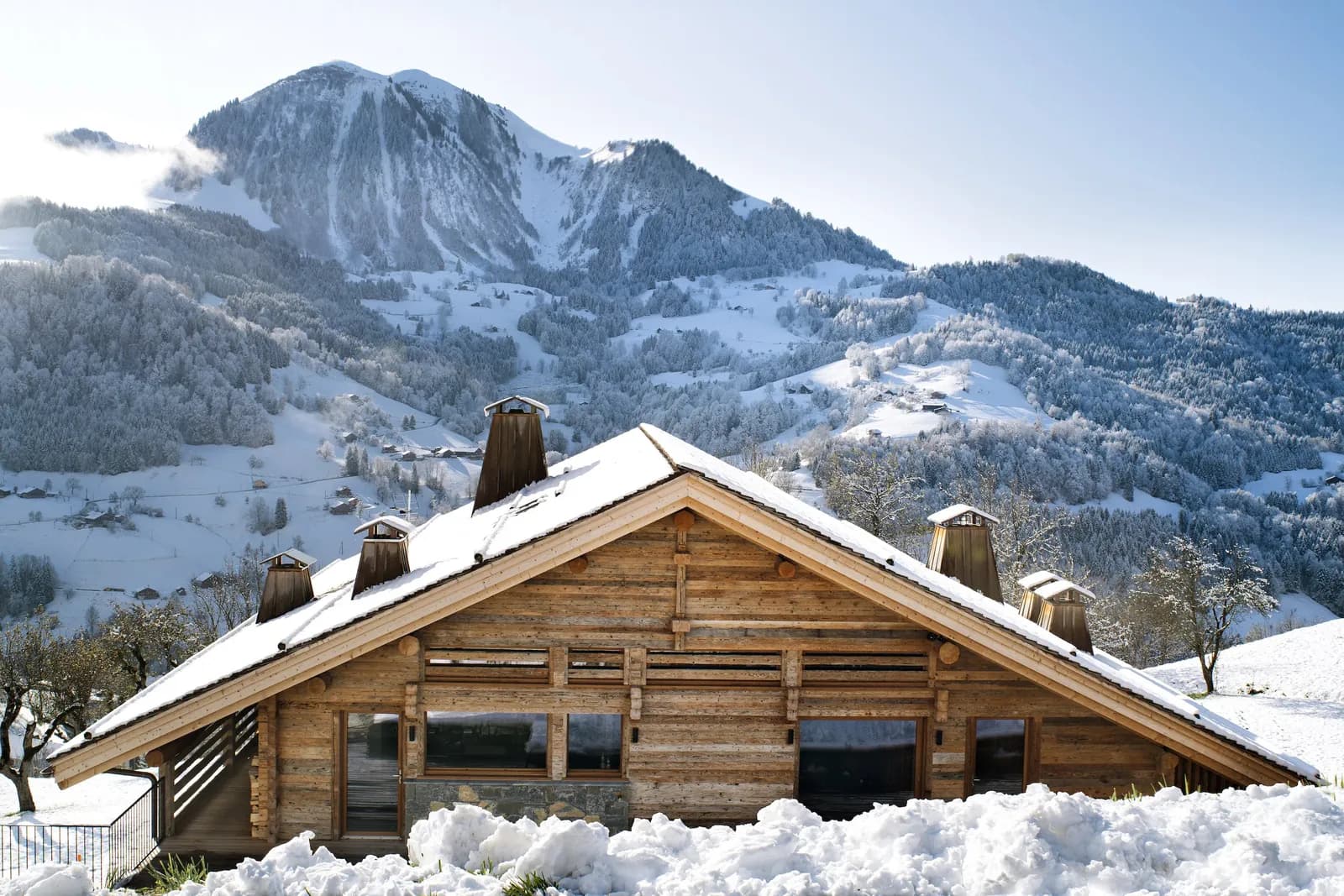 Exterior view of Chalet des Mélèzes, French Alps, a private estate for groups in its grounds, Haute-Savoie, east of Annecy