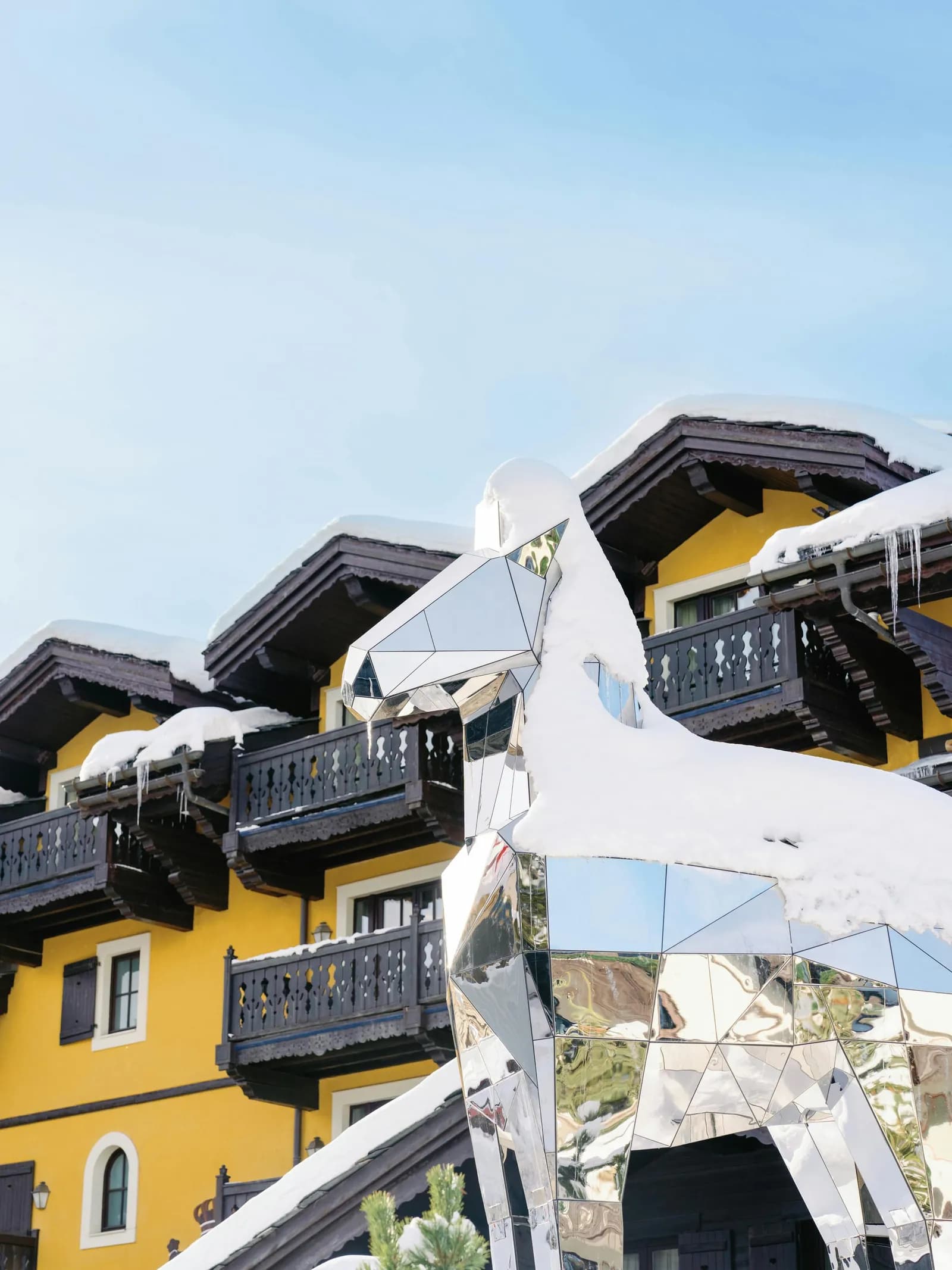 Cheval Blanc Courchevel ski-in ski-out exterior in Courchevel 1850, aerial drone view