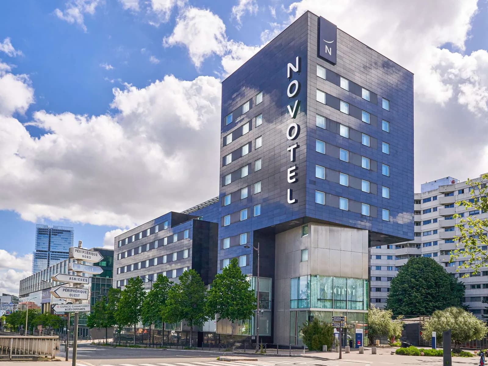 Exterior of Novotel Paris 17 on avenue de la Porte d'Asnières, a tall hotel building in the 17th arrondissement
