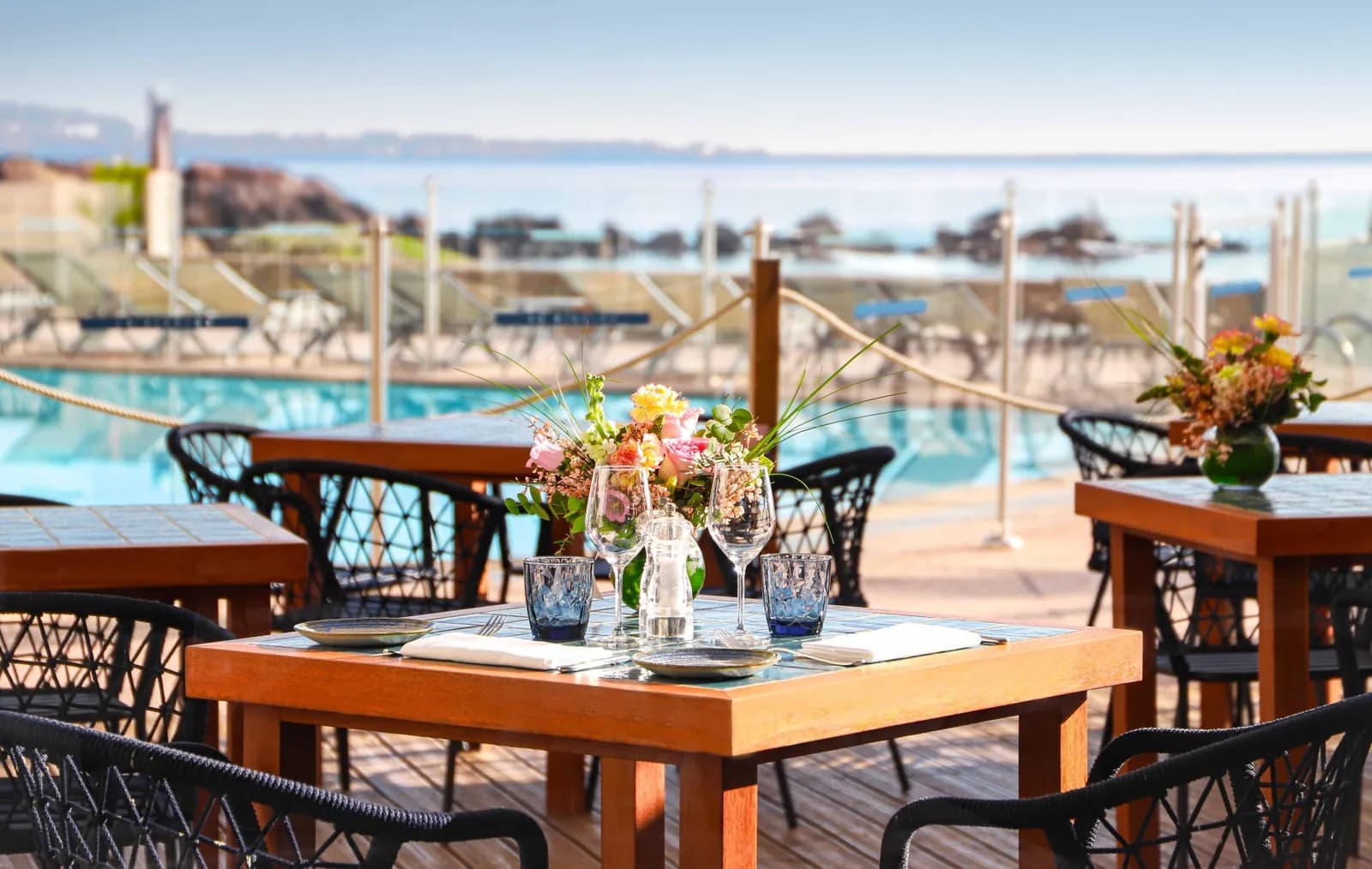 Poolside terrace overlooking the Mediterranean at Pullman Cannes Mandelieu Royal Casino