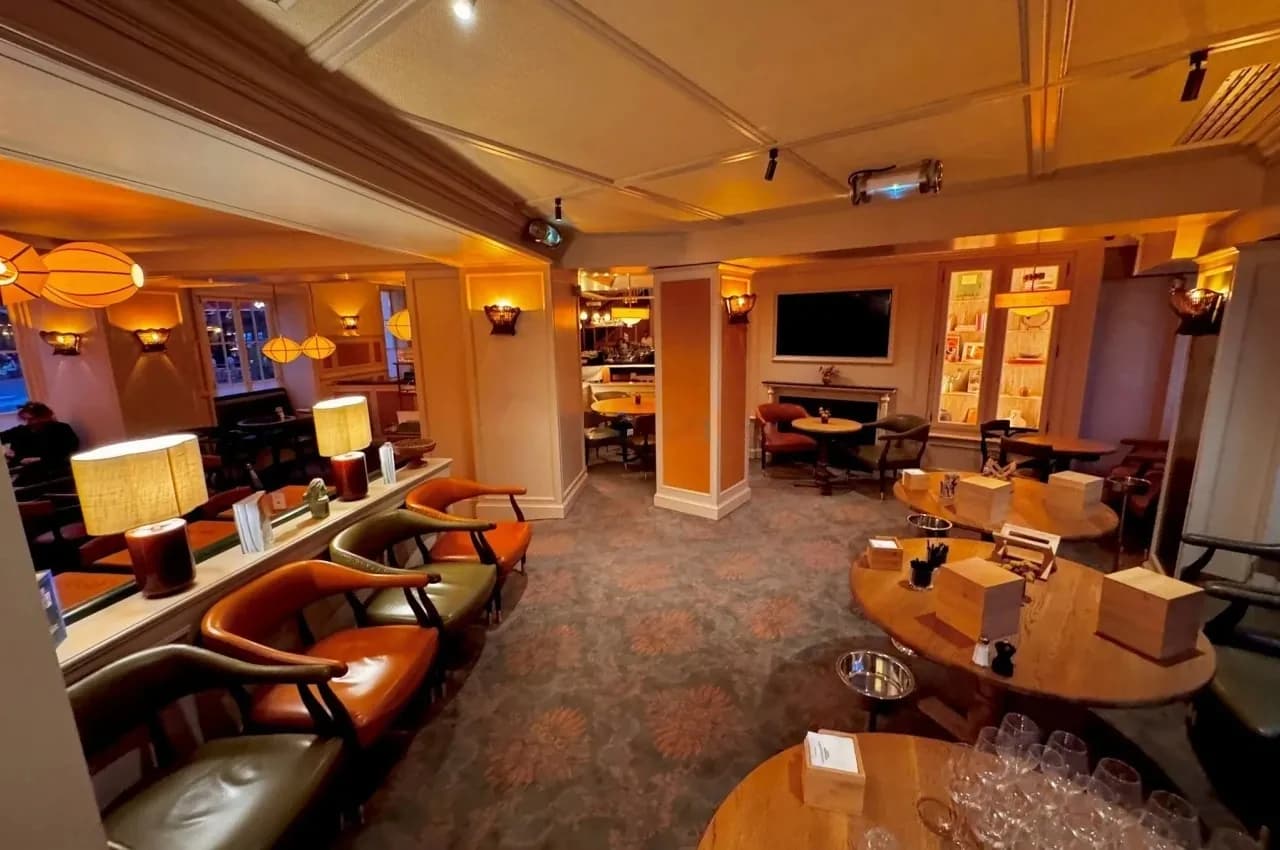 Bar area with leather banquettes and lantern lighting