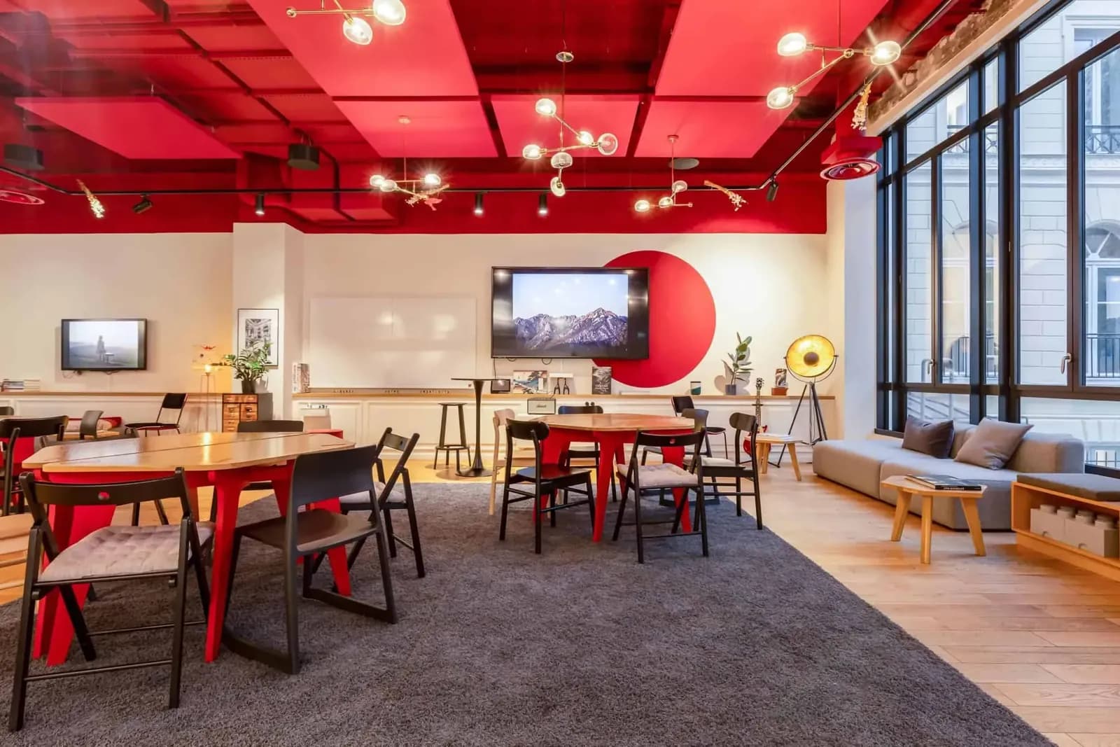 Contemporary room with a red ceiling and large windows