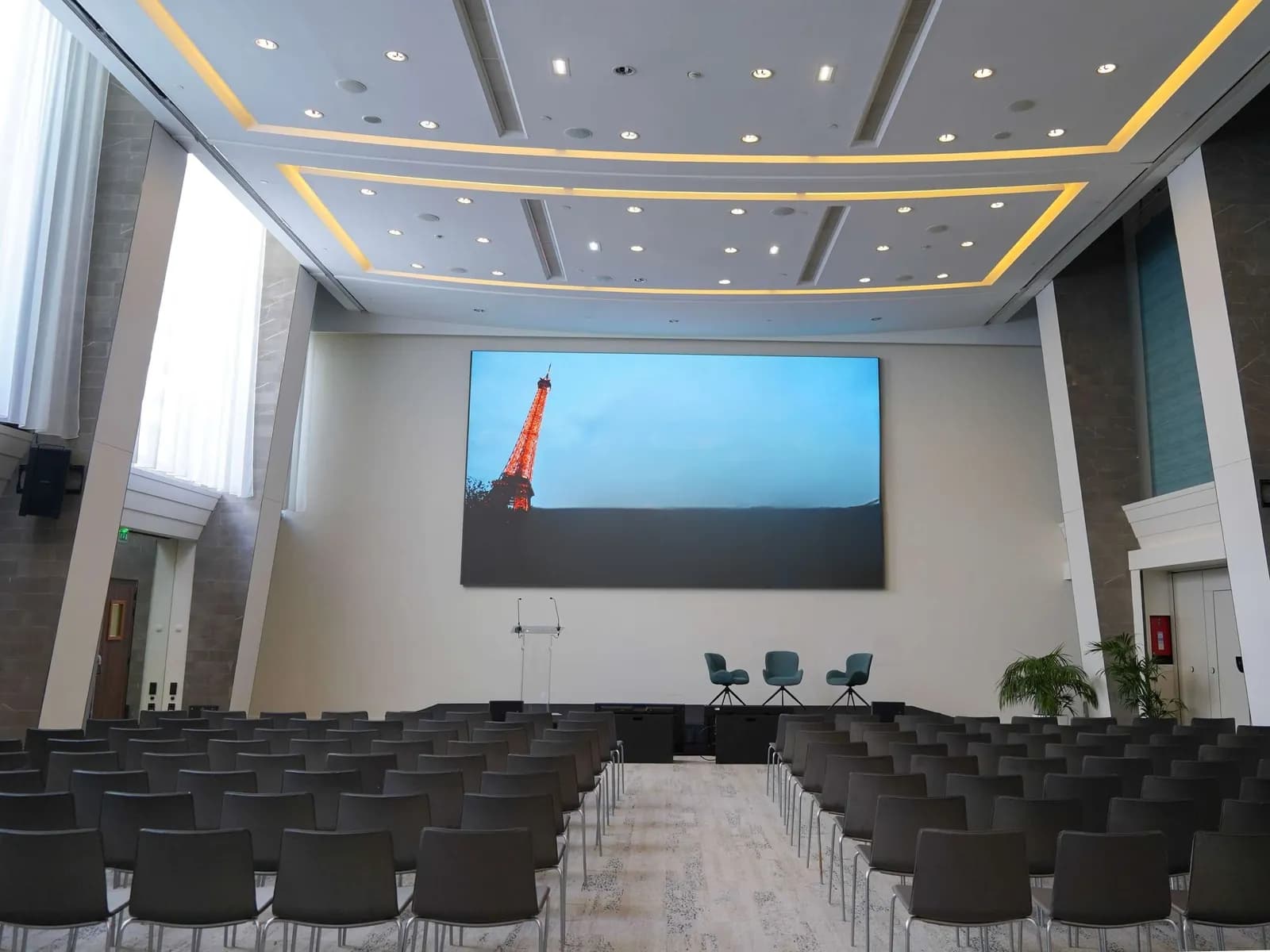 Contemporary auditorium with red and black seats, Paris 15e