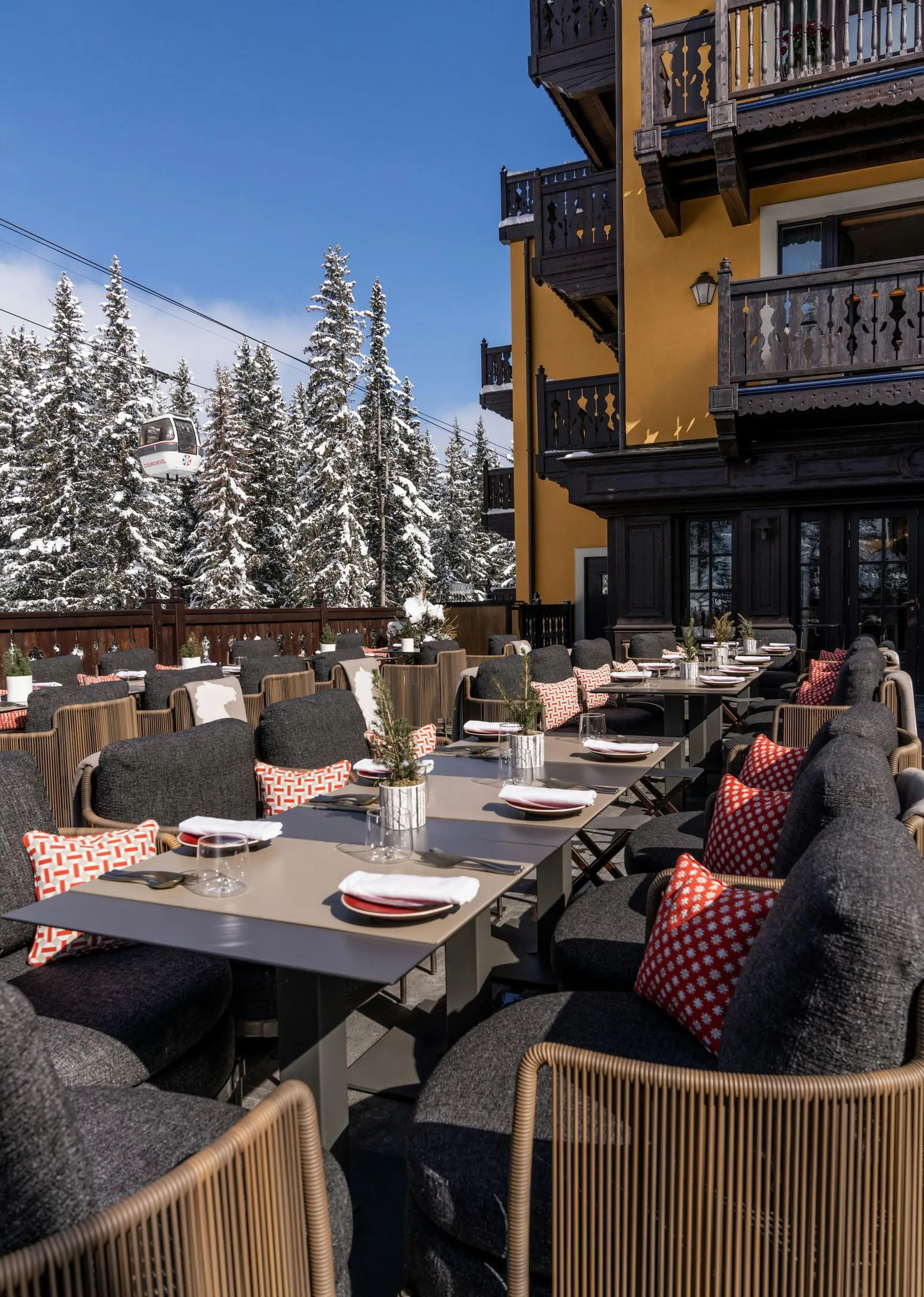 Heated terrace with mountain views at the Cheval Blanc Courchevel hotel in Courchevel 1850