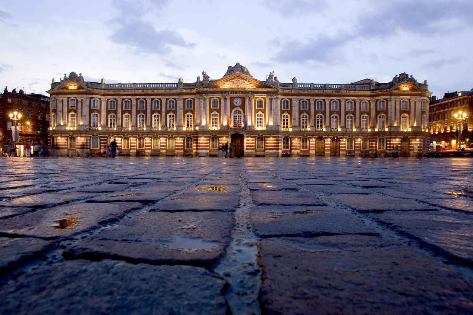 Place du Capitole in Toulouse at dusk, a few steps from the Grand Hôtel de l'Opéra