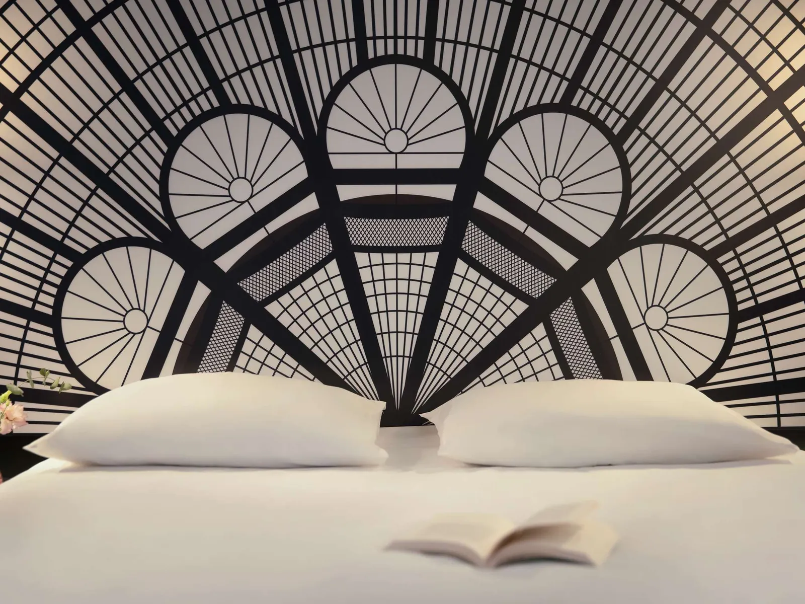 Guest room with a black-and-white art deco headboard at Mercure Paris Porte de Versailles Expo, Vanves