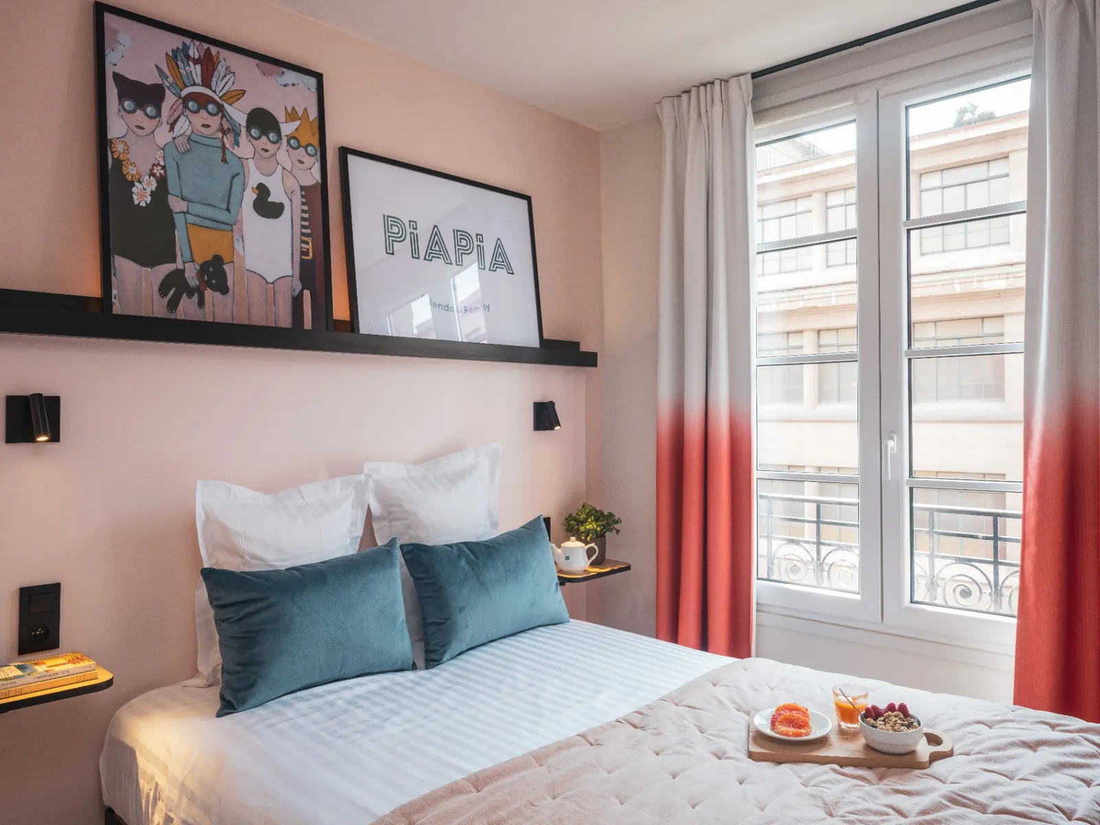 Classic double room at Piapia Hotel Paris with coral curtains, a made bed and a breakfast tray