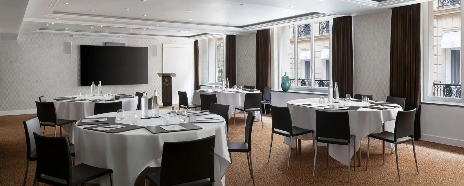 Cabaret-style meeting room at Prince de Galles, a Luxury Collection Hotel, Paris, with round tables