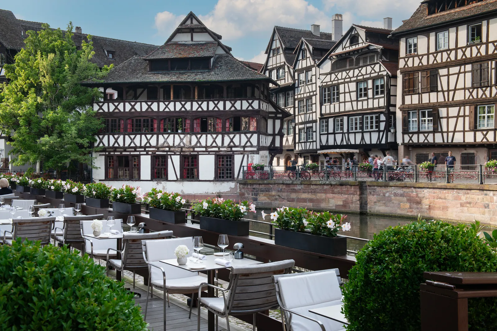 Riverside terrace facing the half-timbered houses of Petite France, Strasbourg city