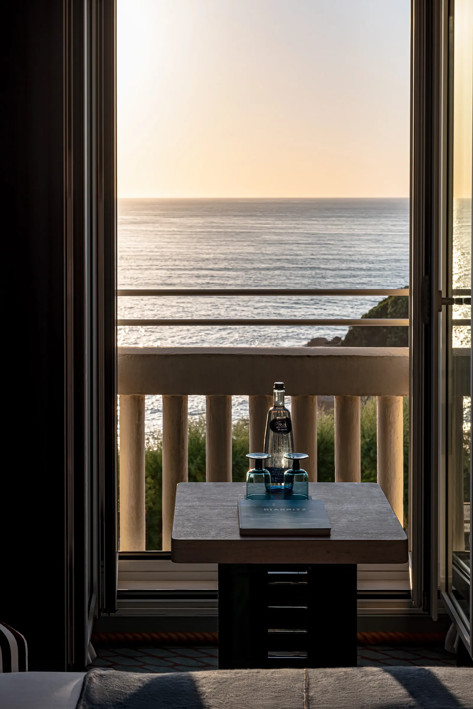 Suite balcony with sea view and an ocean sunrise at Régina Experimental, Biarritz