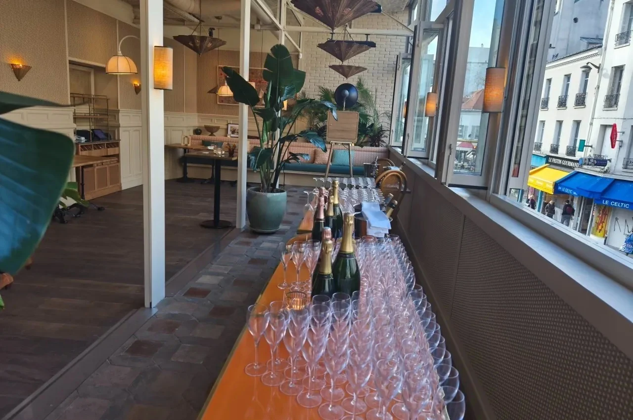 Bar counter with champagne glasses by the window