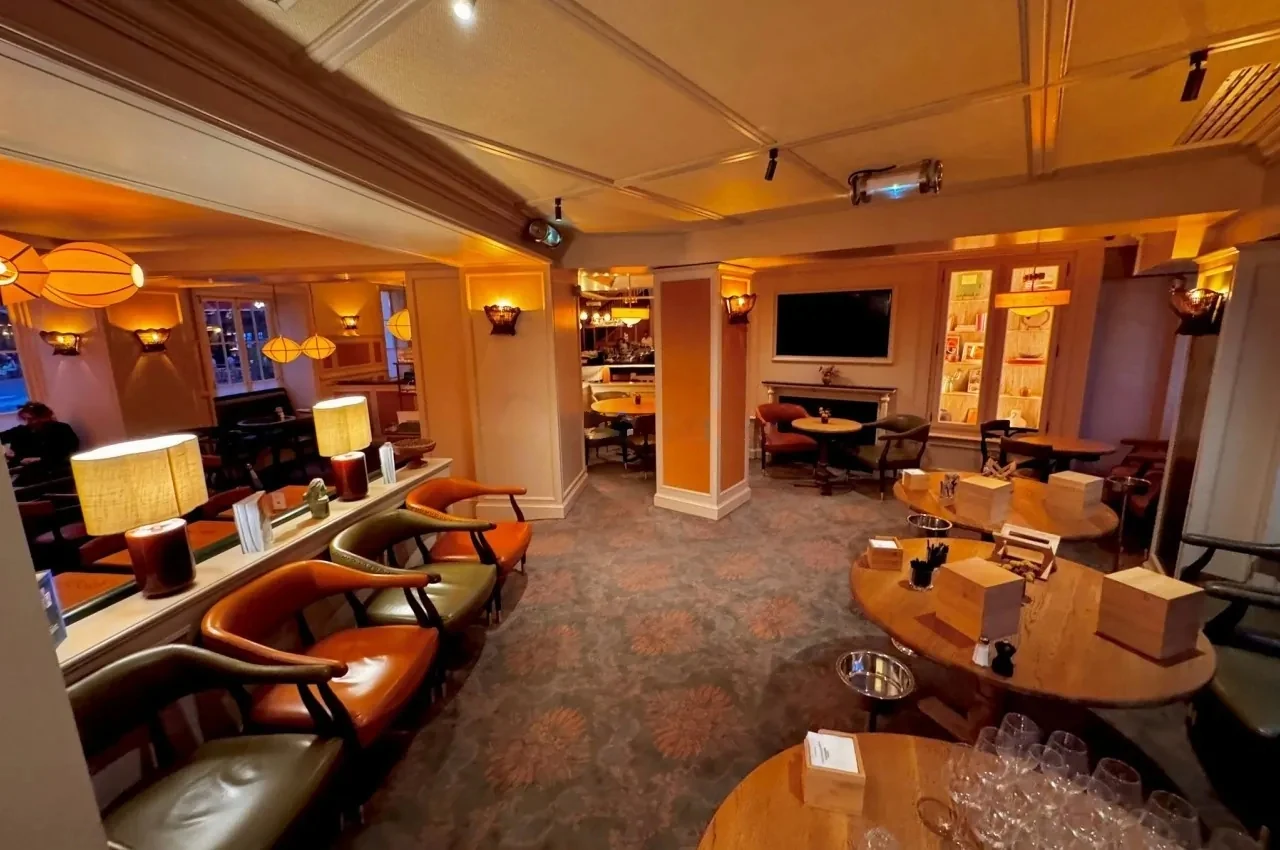 Bar area with leather banquettes and lantern lighting